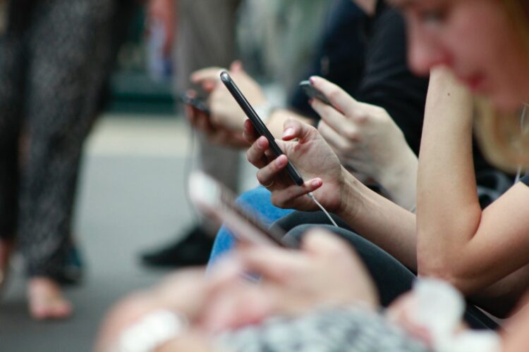 person holding black phone