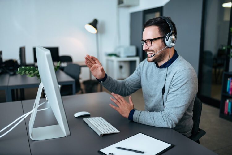 man having an online conversation class