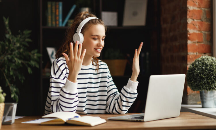 women taking an online english class